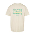 Sandfarbenes oversized T-Shirt existing is a form of bravery von Chaoss, Rückansicht mit großem türkisen Statement-Print